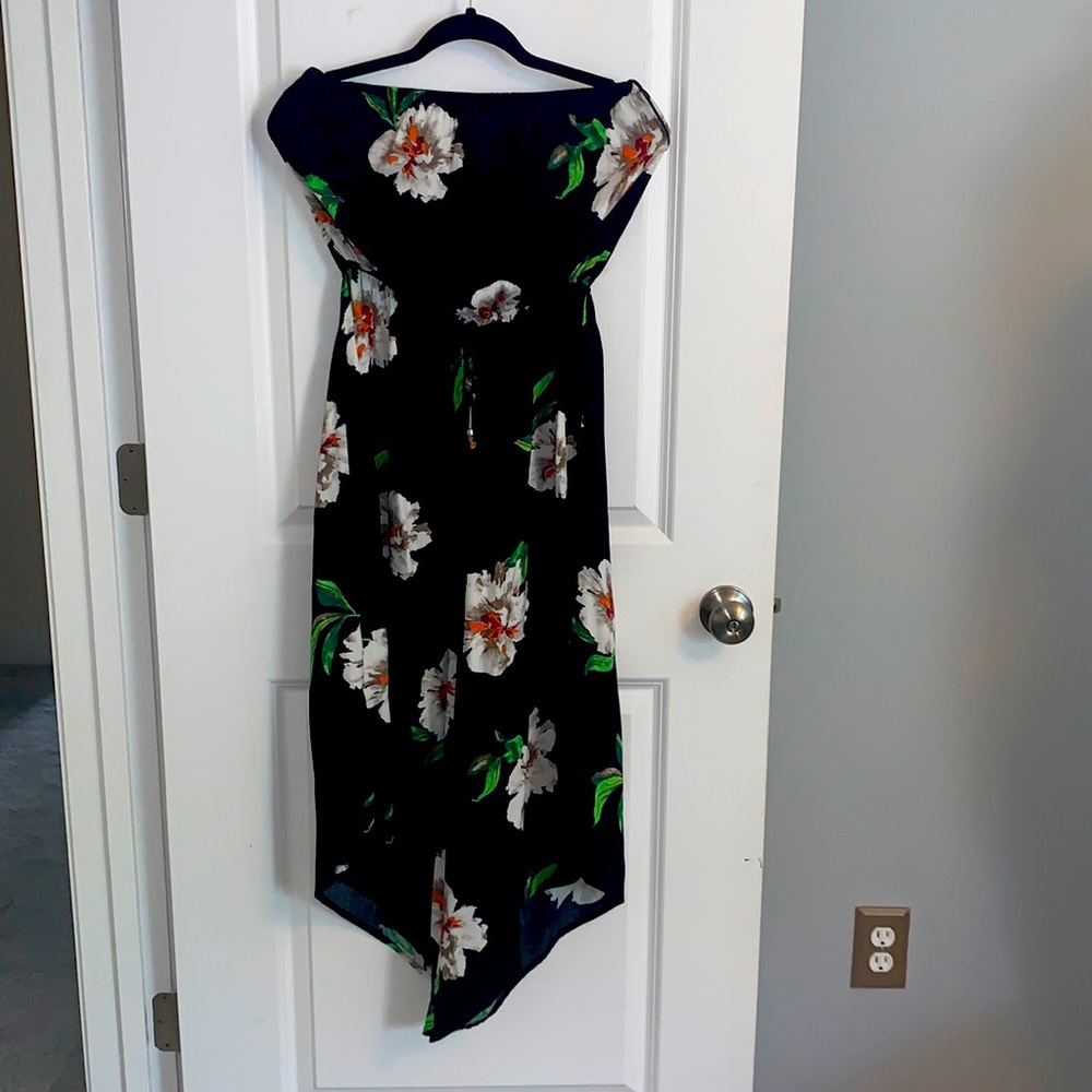 Sleeveless floral jumpsuit.